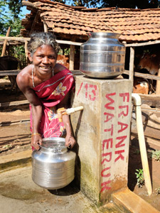 Woman-Collects-Water-from-FW-tap-india-225-300